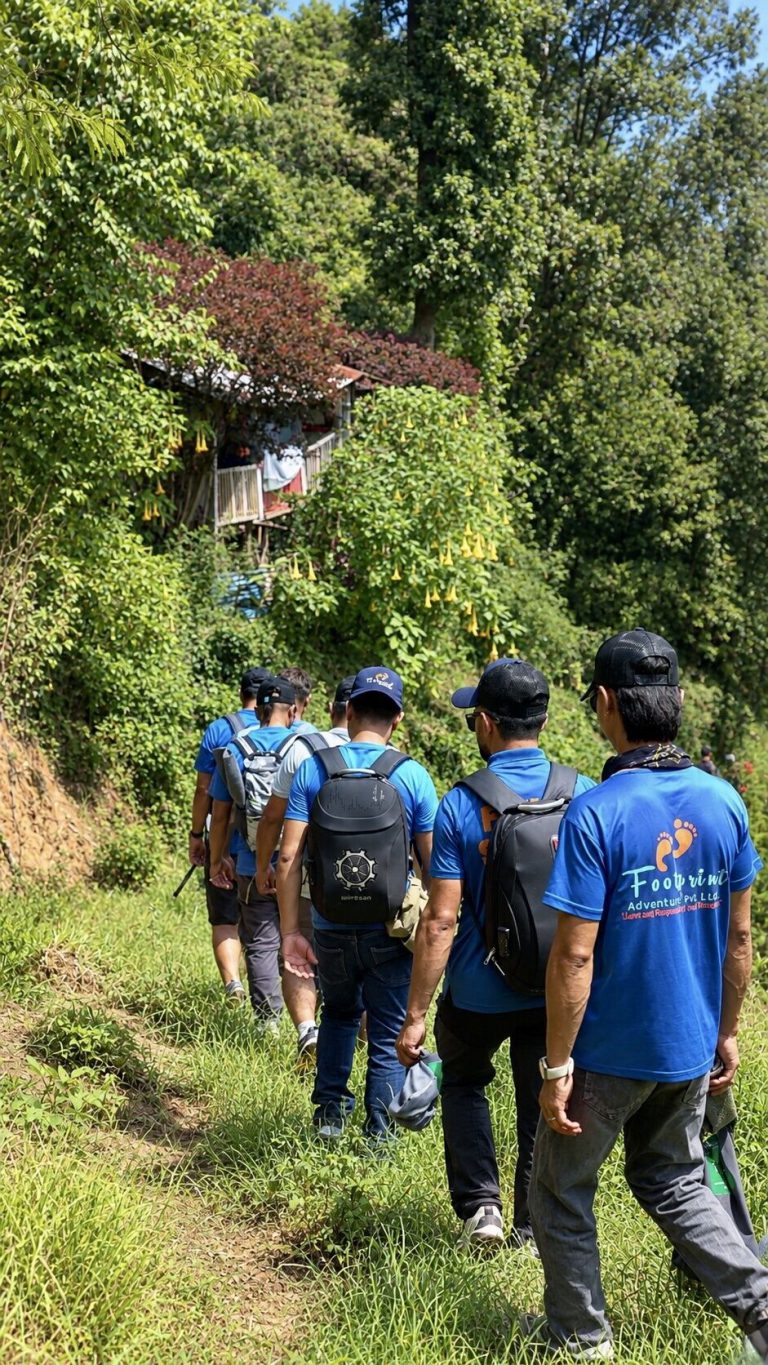 Guide and porter welfare team on the trail